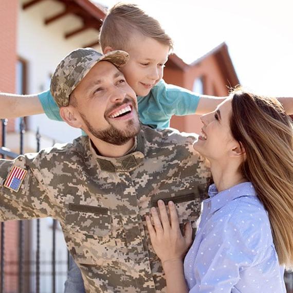 A military family smiling together - Connections Academy